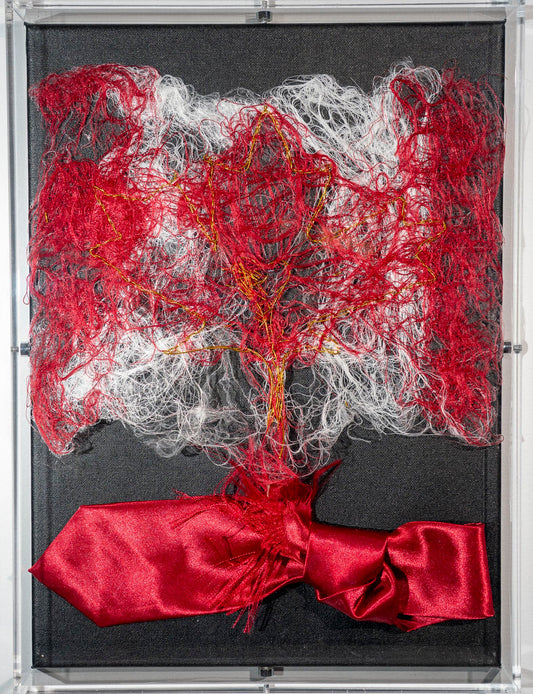 the remains of a trump-red tie from China, shredded forming a cloud of fibres which in turn have become the Canadian flag with an oversized maple leaf picked out in gold and a golden heart in the center. I was thinking of how Trump's aggressive 51st state comments have given rise to a deep national pride in Canada and united most of the population. 